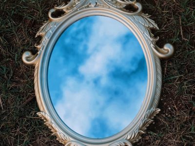 a glass bowl with a blue liquid in it