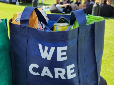 a blue tote bag sitting on top of a table